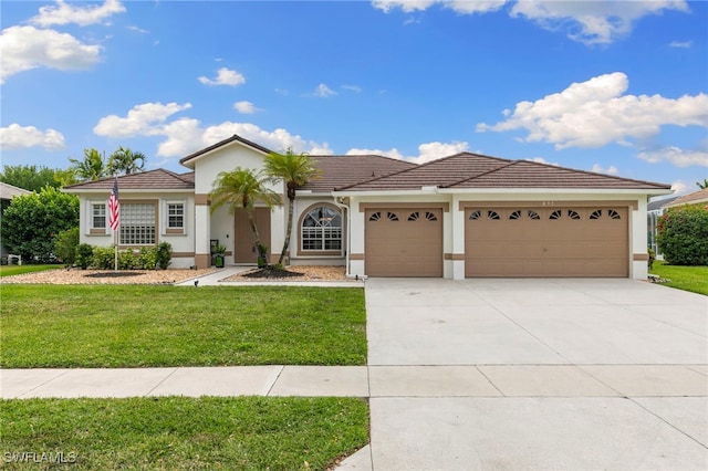 ranch-style house with stucco siding, a front lawn, a tile roof, concrete driveway, and an attached garage