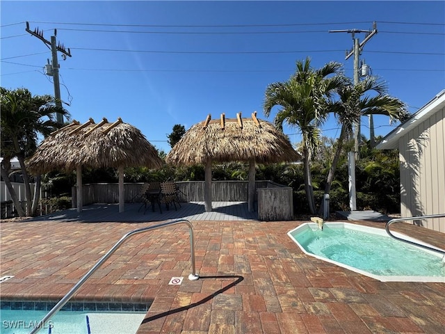 view of pool featuring a gazebo and a patio area