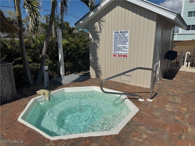 view of swimming pool with a patio area