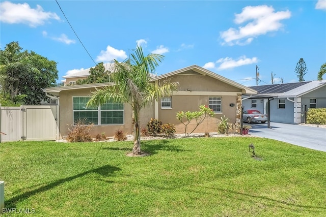 single story home featuring a front yard