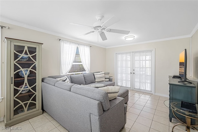 living room with ornamental molding, light tile patterned flooring, ceiling fan, and french doors