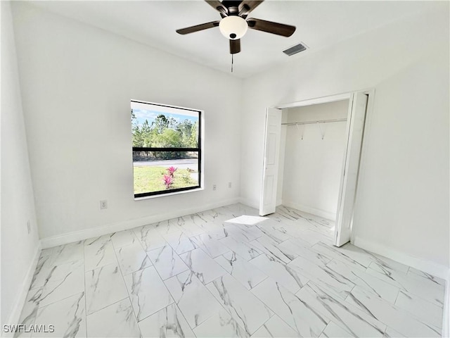 unfurnished bedroom with a closet and ceiling fan