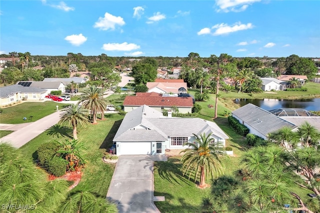 birds eye view of property featuring a water view