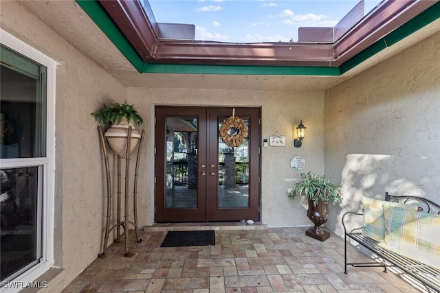 doorway to property with french doors