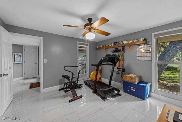 exercise area with ceiling fan