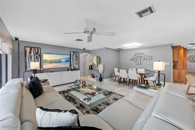 living room with ceiling fan