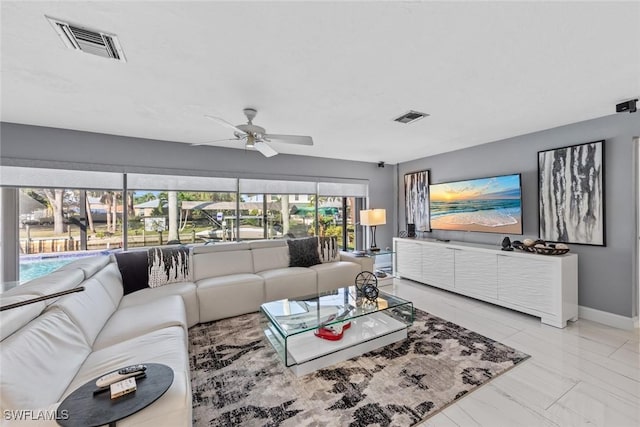 living room with ceiling fan