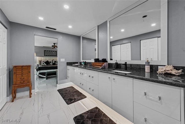 bathroom with vanity and ceiling fan