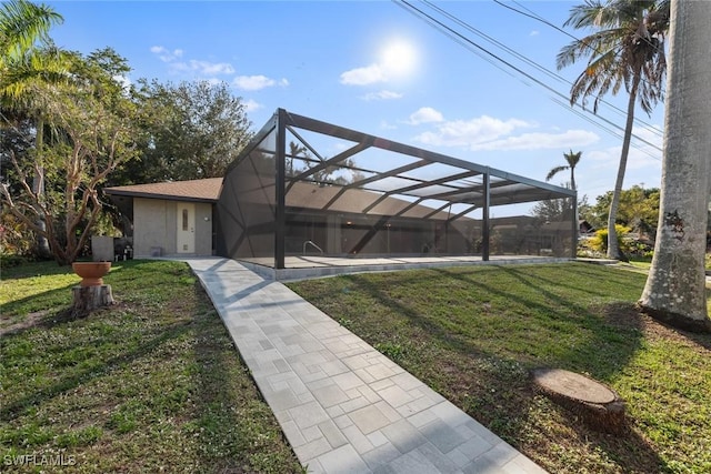 view of yard featuring a lanai