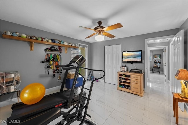 exercise room featuring ceiling fan