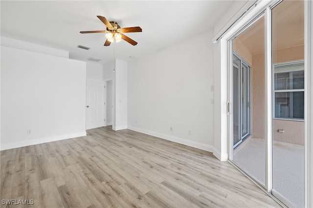 unfurnished room with light hardwood / wood-style floors and ceiling fan