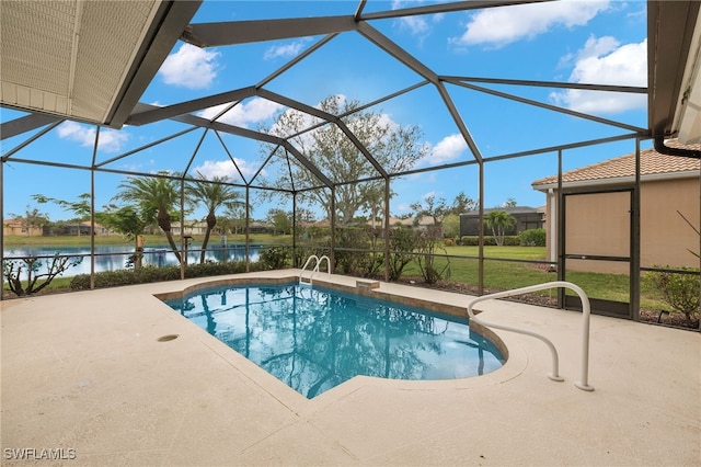 view of pool with a yard, a lanai, a patio area, and a water view