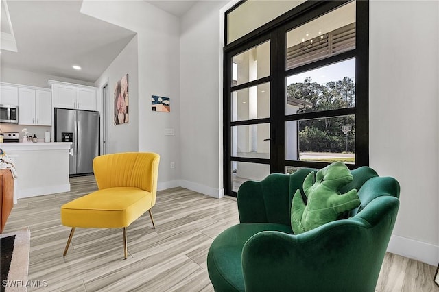 living area featuring light wood-type flooring