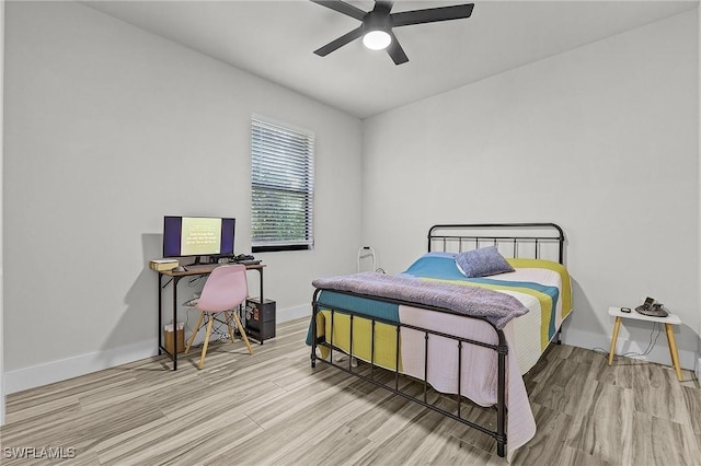 bedroom featuring ceiling fan and light hardwood / wood-style floors