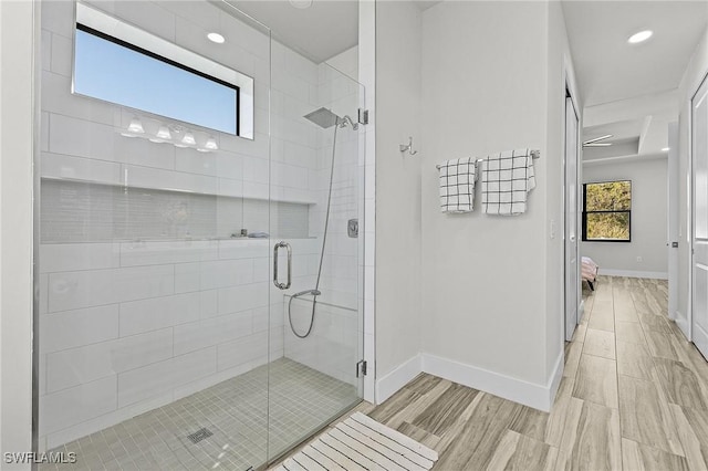 bathroom with a wealth of natural light and walk in shower