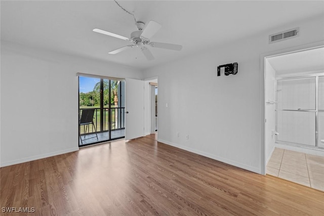 unfurnished room with wood-type flooring and ceiling fan