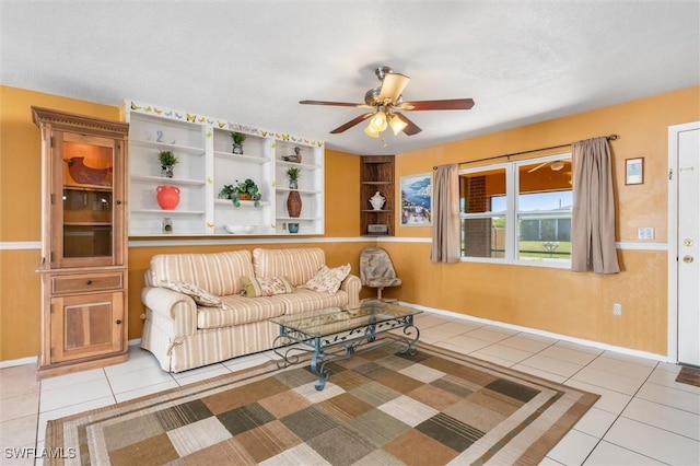 living room featuring light tile patterned flooring and ceiling fan