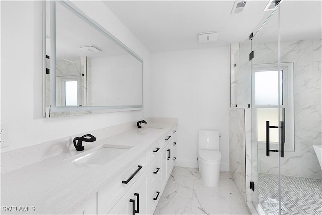 bathroom featuring vanity, a wealth of natural light, an enclosed shower, and toilet