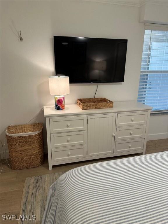 bedroom featuring light wood-type flooring