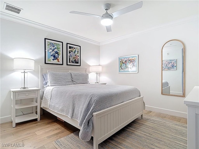 10401 Mcarthur Palm Ln Unit 2525, Fort Myers, FL 33966 - bedroom featuring visible vents, wood finished floors, baseboards, and ornamental molding