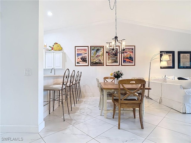 10401 Mcarthur Palm Ln Unit 2525, Fort Myers, FL 33966 - dining room featuring a chandelier, lofted ceiling, baseboards, and ornamental molding