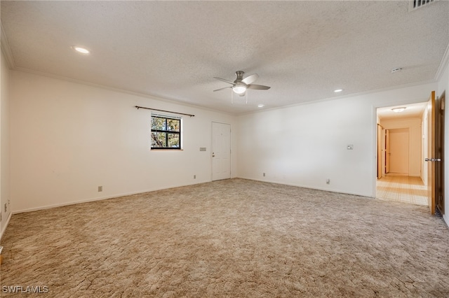 carpeted spare room with ceiling fan, a textured ceiling, ornamental molding, and recessed lighting