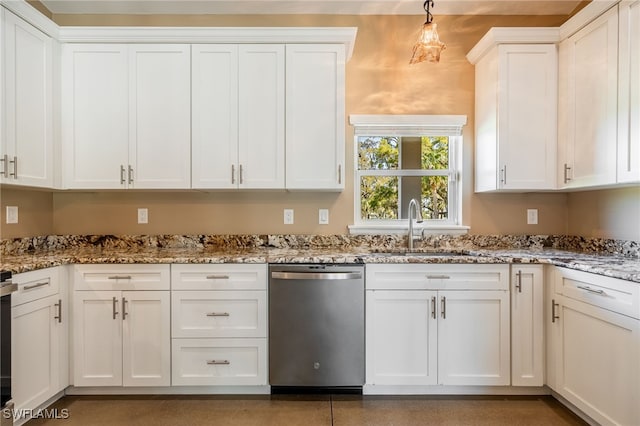 kitchen featuring light stone counters, white cabinets, dishwasher, and a sink