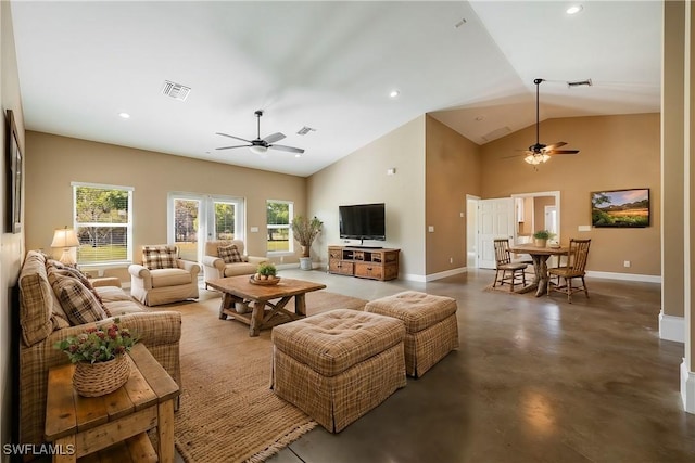 living room featuring visible vents, baseboards, high vaulted ceiling, and finished concrete floors