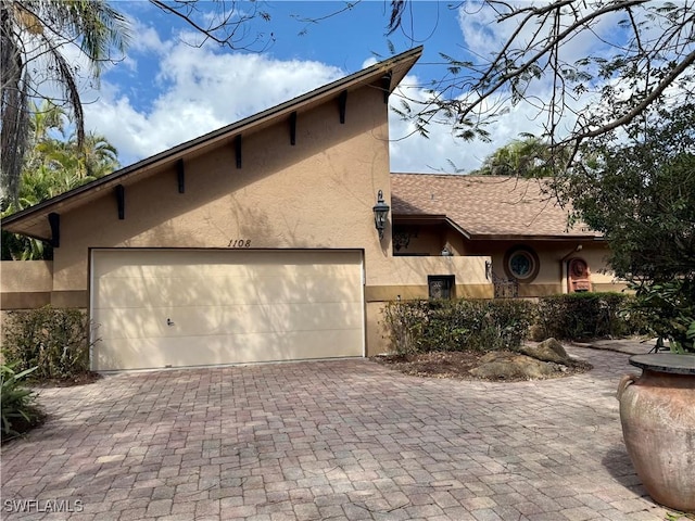 view of front of house with a garage