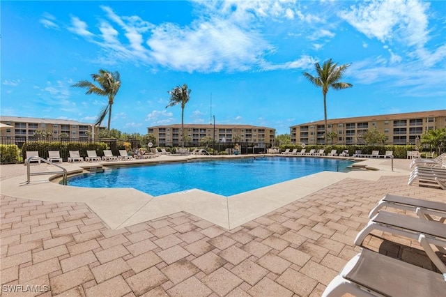 view of pool featuring a patio area