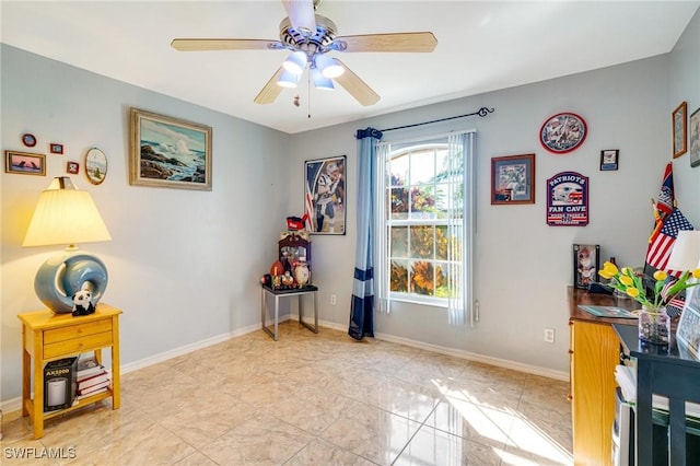 interior space with ceiling fan