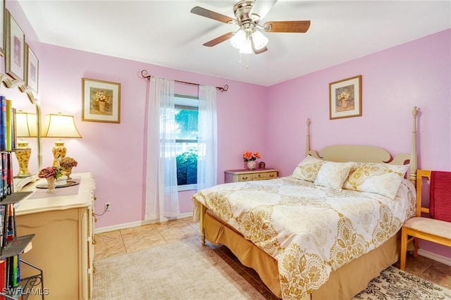 tiled bedroom with ceiling fan