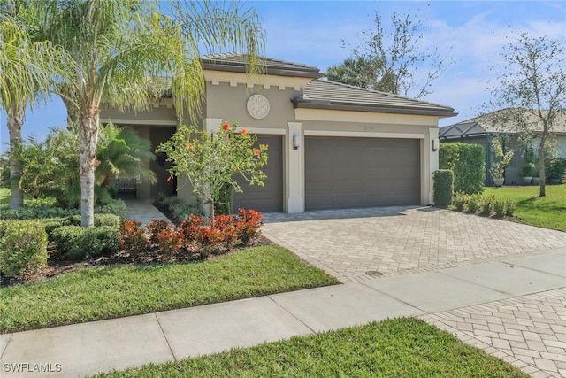 view of front of house with a garage