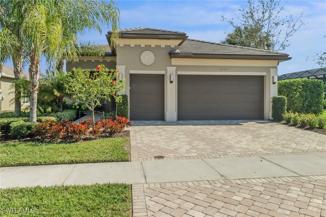 view of front of home featuring a garage