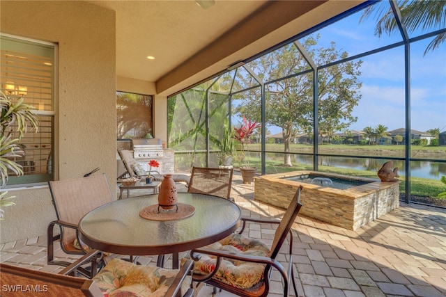 sunroom with a water view