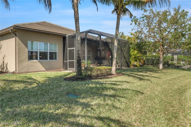 view of yard featuring a lanai