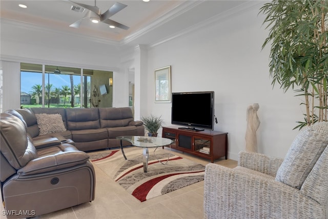 living room featuring ceiling fan and ornamental molding