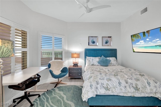 bedroom featuring ceiling fan and light wood-type flooring