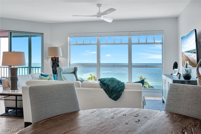 dining area featuring a healthy amount of sunlight, hardwood / wood-style floors, and ceiling fan