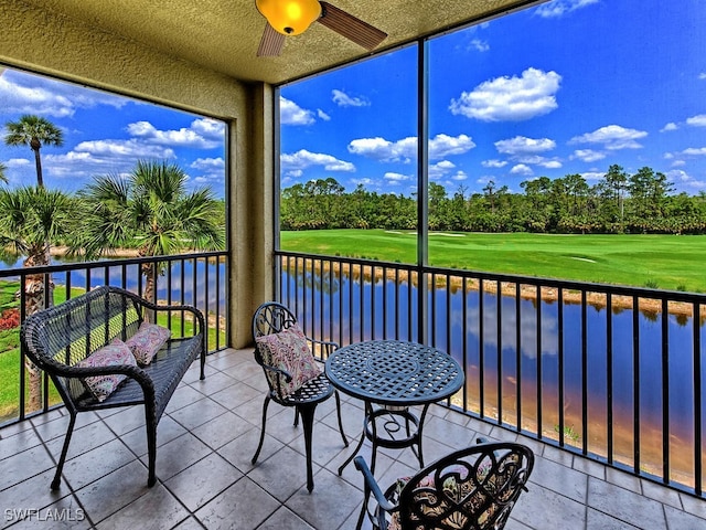 sunroom with a water view