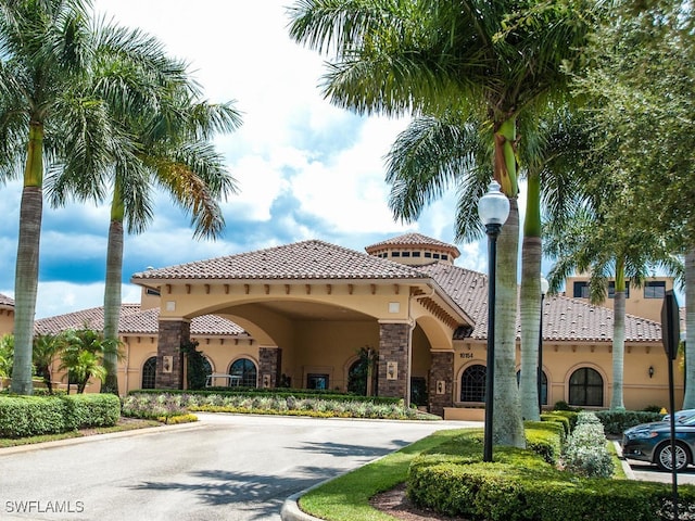 view of property with driveway