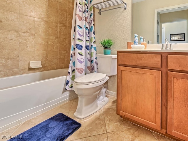 full bathroom featuring toilet, shower / tub combo, vanity, and tile patterned floors