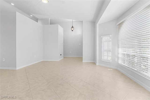 empty room featuring light tile patterned floors