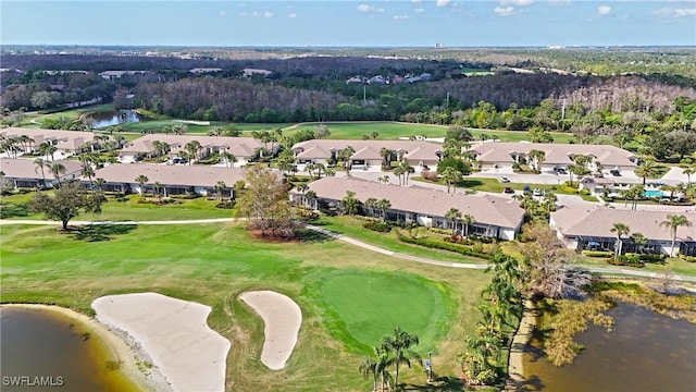 aerial view with a water view, a residential view, and view of golf course