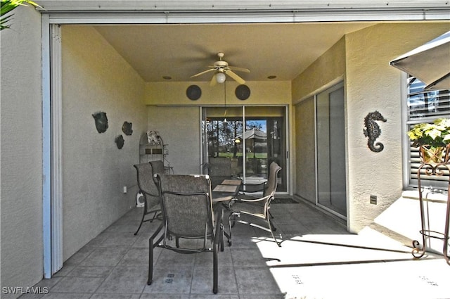 view of patio / terrace featuring ceiling fan and outdoor dining space