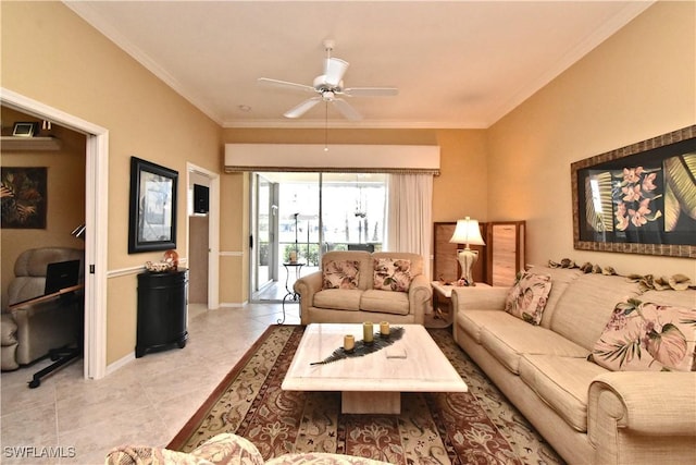 living area with baseboards, light tile patterned floors, a ceiling fan, and crown molding