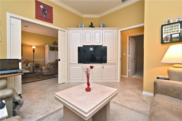 living room with baseboards and ornamental molding