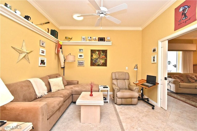 living area featuring baseboards, light tile patterned floors, ornamental molding, and ceiling fan