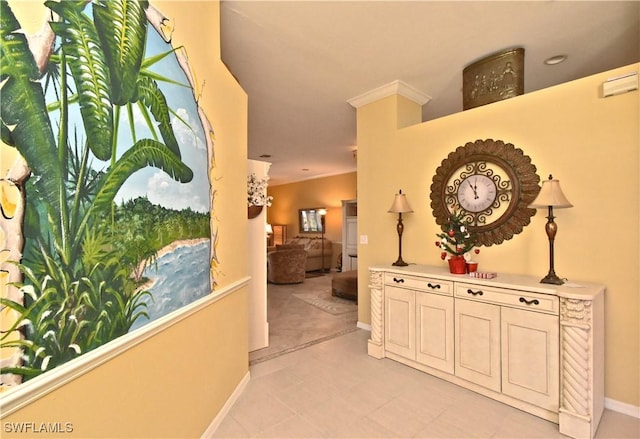hallway with crown molding and baseboards
