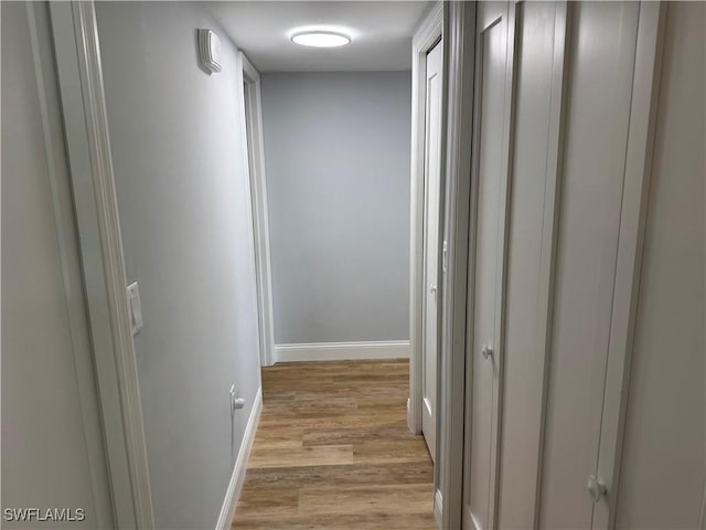 hallway featuring light hardwood / wood-style flooring